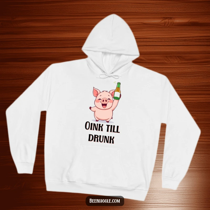 Funny hoodie showcasing a gleeful pig character holding a beer bottle aloft, perfect for cozy, festive vibes.