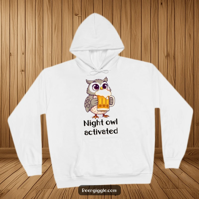 Funny owl with wide, happy eyes clutching a beer stein, embodying cozy, hilarious cheer in this comfortable hoodie.
