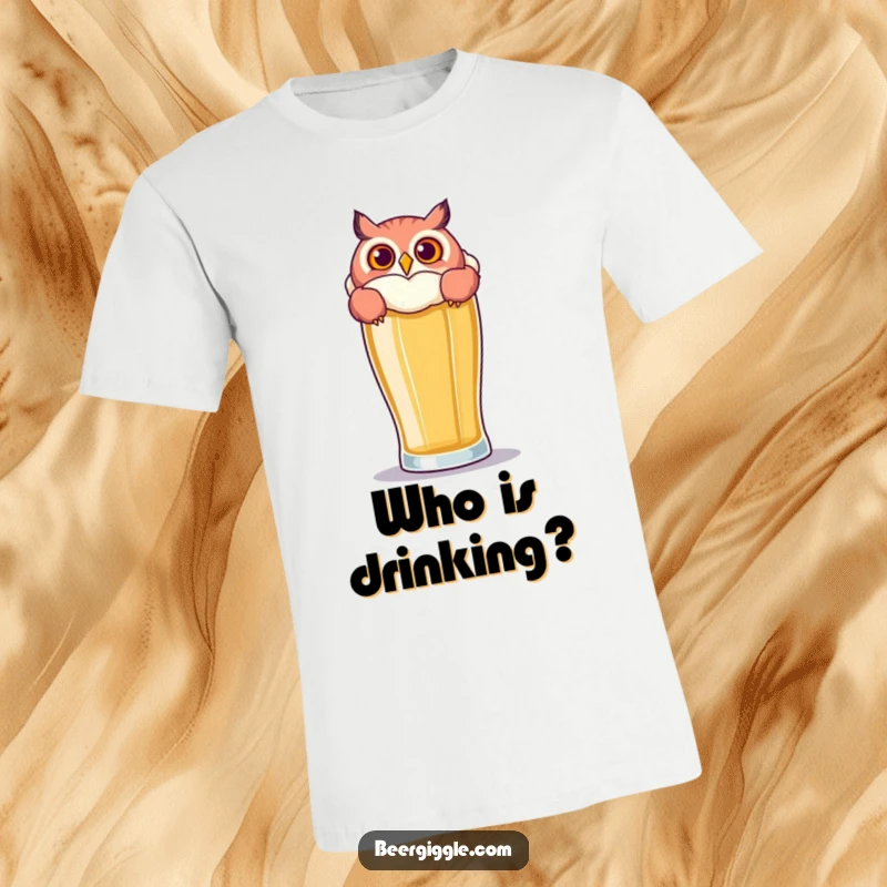 Funny Owl Beer T-Shirt: A playful owl peeks over a large beer glass, showing off its humorous curiosity.